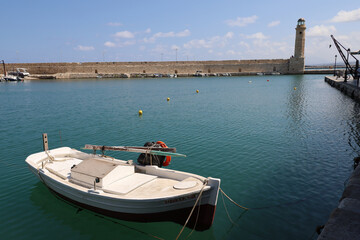 Fototapeta premium The Venetian port of Rethymno in Crete with its lighthouse, Greece
