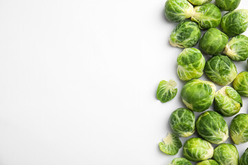 Fresh Brussels sprouts on white background, top view. Space for text