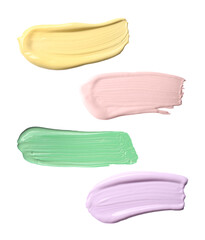 Set with strokes of color correcting concealers on white background, top view