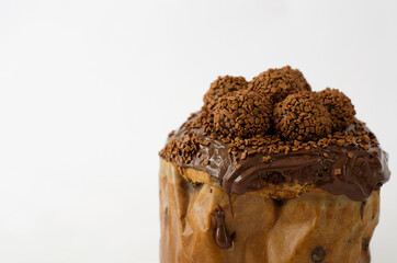 Brigadeiro stuffed sweet bread with chocolate balls isolated on the right