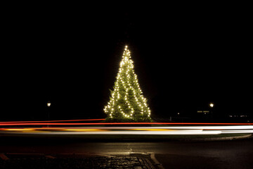 Christmas tree in the Park, Decorated with lights and light trails around, Xmas tree, merry, car...