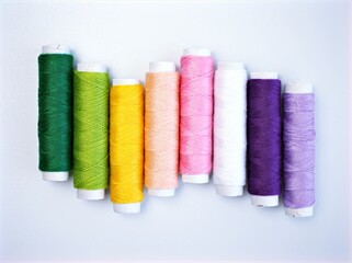 needle and thread ,Sewing spool of thread and scissors isolated on white background	