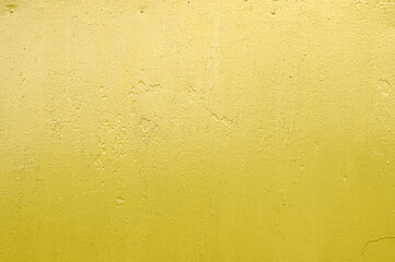 Leaked paint of yellow old metal