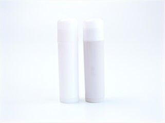 white cosmetic container ,Bottle lotion isolated on white background ,empty lipstick	