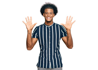 African american man with afro hair wearing casual clothes showing and pointing up with fingers number ten while smiling confident and happy.