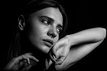 Fototapeta premium Black and white portrait of a young woman