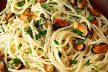 Spaghetti with mussels and clams, Mediterranean food, close up