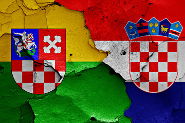 flags of Bjelovar-Bilogora County and Croatia painted on cracked wall