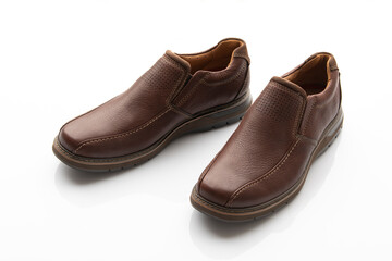 Pair of Brown Slip on Shoes Isolated on White Background