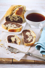 Homemade marble cake and cup of tea