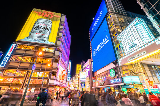 Dotonburi,the famous attraction with full of advertising sign and popular Glico Man billboard and canal.A lot of tourist come to shopping at here:OSAKA,JAPAN-NOVEMBER 17, 2018