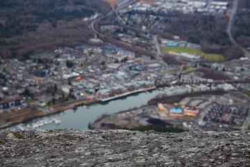 Blurred city view with mountain rock