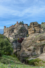 Fototapeta na wymiar Varlaam monastery, an unesco world heritage site, located on a unique rock formation above the village of Kalambaka during fall season.