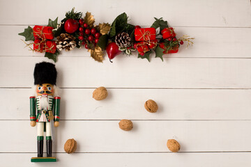 Interesting beautiful Christmas ornaments decorations with nutcracker soldier on white colored...