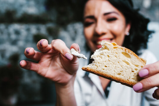 Mexican Woman Eating Rosca De Reyes Or Epiphany Cake, Roscon De Reyes With Traditional Mexican Chocolate Cup