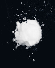 snowball splat on black wall