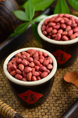Peanuts on the background of retro Chinese style.The Chinese meaning in the picture is happiness