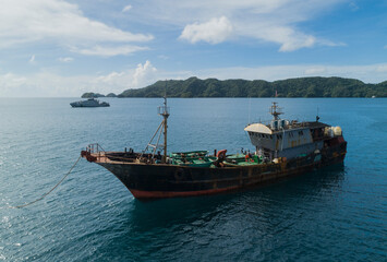Illegal Chinese Fishing Vessel apprehended in Palau Marine Sanctuary with patrol vessel "PSS Remeliik 2" in background