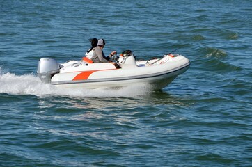 Fototapeta premium Sporty two place pontoon motorboat