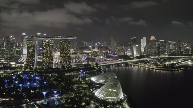 4K Aerial of Marina Bay Singapore downtown Skyline at night