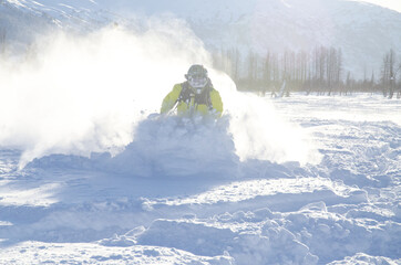 Snowmachine rider "Sledder" in Alaska