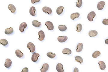 Top view of dry gray beans on a white background