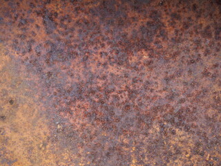 Oxidized metal surface, Closeup to rust on iron surface, Abstract rusty metal panel texture background, Selective focus.