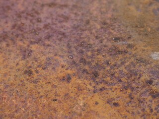 Oxidized metal surface, Closeup to rust on iron surface, Abstract rusty metal panel texture background, Selective focus.