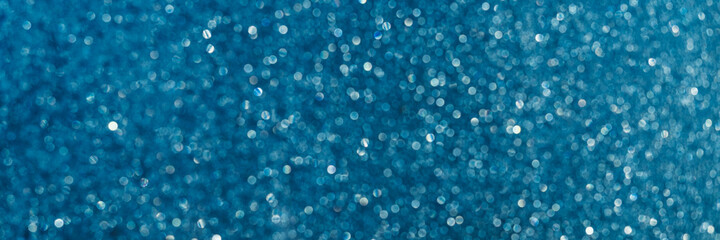 Blurred abstract glitter texture.