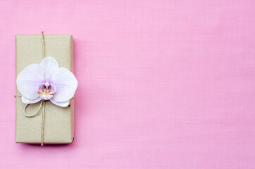 Gift box with ribbon and flower