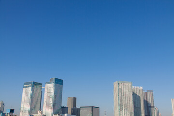 Fototapeta premium Modern high rise buildings against the blue sky