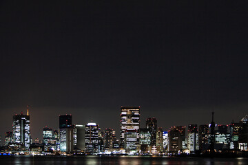 Fototapeta premium Illuminated skyscrapers of Tokyo in the night