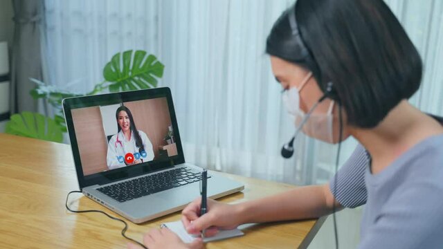 Caucasian young girl consults doctor for health problem on video call.