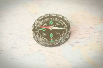 compass on map, compass and map