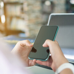 Woman hand using smartphone to do work business, social network, communication.