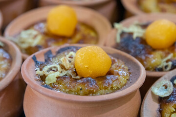 Thai dessert in small clay pots or bowls