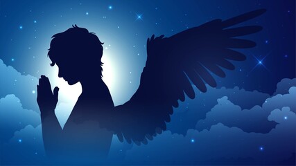 Praying silhouette of an angel on a background of the starry sky