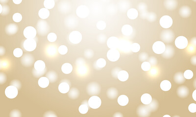 Light bokeh gold background. Festive defocused lights. Holiday glowing white lights with sparkles. Blurred bright abstract bokeh on light golden background.