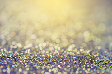 blurred sparkling color glitter light as abstract festive background for website banner and card decoration
