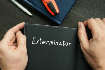 Business concept about Exterminator with sign on the piece of paper.
