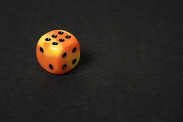 dice on a black table