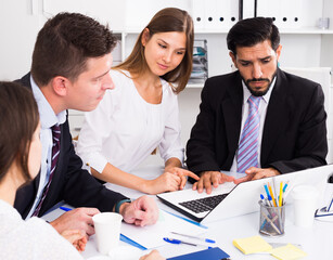 Fototapeta premium Business people developing strategy for teamwork in modern office with laptop