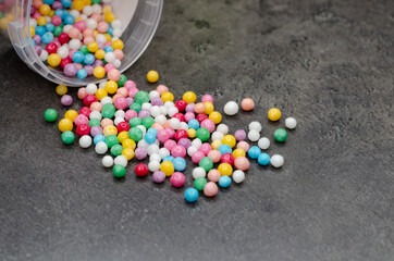 Round, multi-colored candies. Candy closeup on a white background.