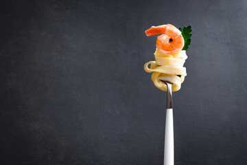 Fork with pasta and shrimp