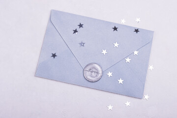 grey paper envelope with a wax seal branches on the background. background for Valentine's day