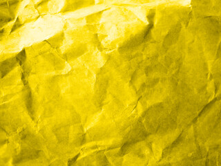 yellow crumpled paper close-up. presentation of fashion colors 2021