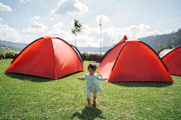 Little girl enjoyed playing at the garden campsite that day