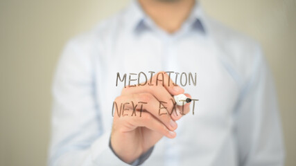 Mediation Next Exit, man writing on transparent screen