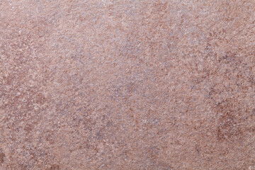 Dark brown texture background with pattern of worn rusty metal.