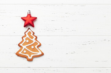 Christmas card with fir tree gingerbread cookie